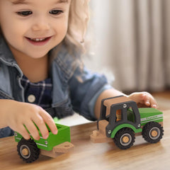 WoodenEdu green farm tractor invites tiny hands to explore on a safe surface.