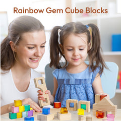Woodtoe Rainbow Blocks: 25 gem cubes in nine colors for sensory stacking.