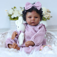 WOOROY Realistic Reborn Baby Doll 18-inch curly hair with pink bow for charming styling