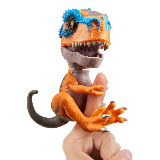 WowWee Untamed T-Rex Scratch orange closeup showing gripping jaws