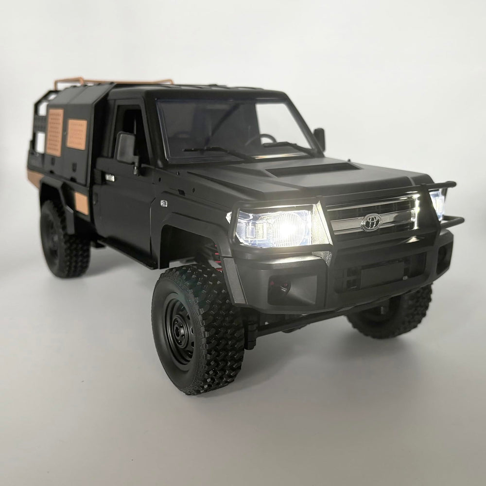 WPLDEWAN MN82S side view shows 4WD traction on terrain