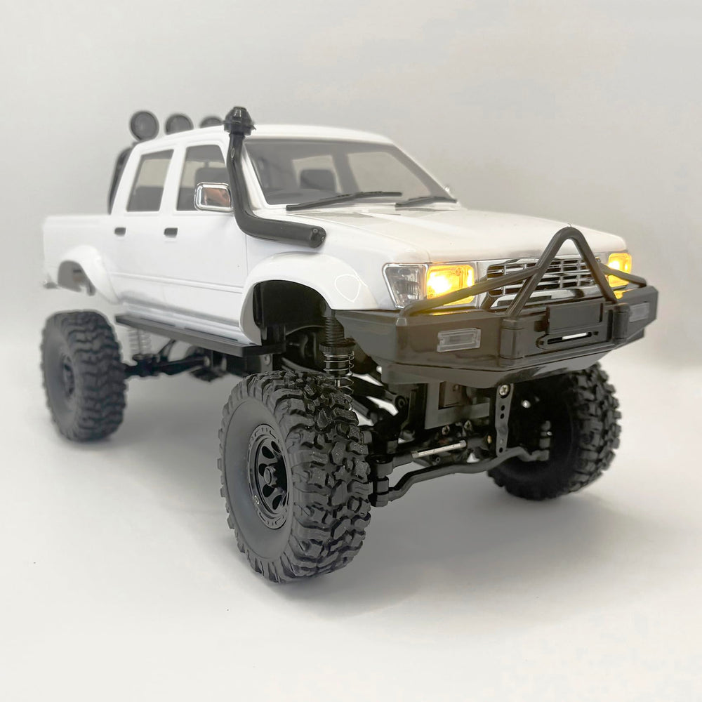 WPLDEWAN WPL C64-1 RTR suspension articulation for challenging rock trails.