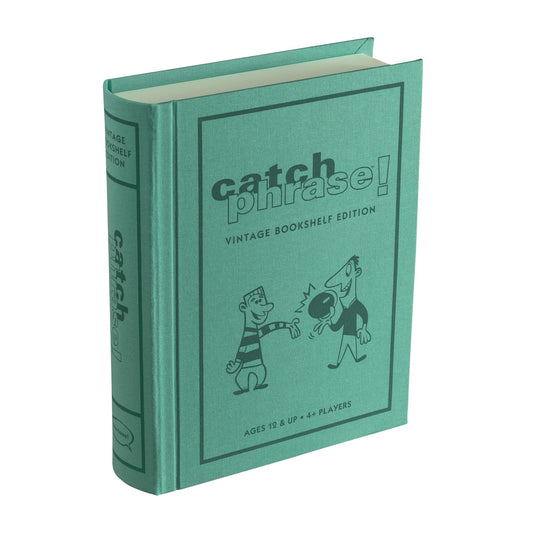 WS Game Company Catch Phrase on a vintage linen-wrapped bookshelf for stylish storage.