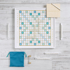 WS Game Company Scrabble Bianco Edition racks and pouch organize tiles neatly.