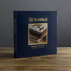 WS Game Company Scrabble Deluxe hidden storage compartment keeps components organized.