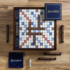 WS Game Company Scrabble Deluxe mahogany cabinet with built-in storage for organization.