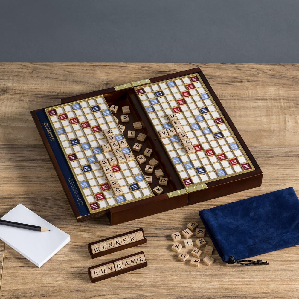 WS Game Company Scrabble Deluxe Travel slide-out storage keeps components organized.