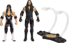 WWE authentic ring-gear detail on Bret Hart and Undertaker figures.