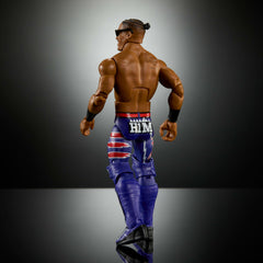 WWE Carmelo Hayes Elite figure in dynamic pose highlighting articulation.