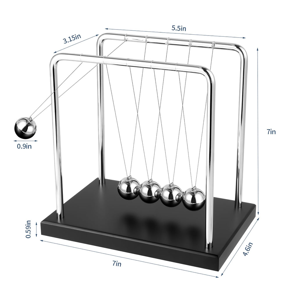 WXBRMCRY Newton's Cradle beads in motion illustrates physics principles in a calm desk setting.