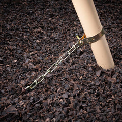 XDP Recreation auger-style anchors ready for installation into lawn for swing set support.
