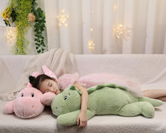 XMV dinosaur weighted plush presented as a gift-ready décor item.