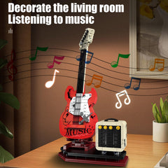 XYDongtong Bluetooth reverb amplifier display with guitar vibes.