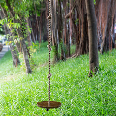 Yangbaga outdoor swing in use by child on a sunny backyard day
