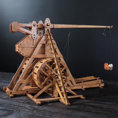 YAQUMW firing trebuchet demo illustrating motion on a tabletop