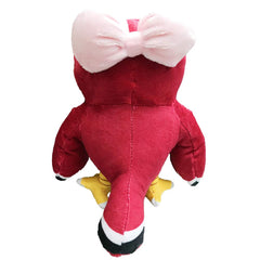 Ycixri Celeste owl plush on bed; cozy bedroom décor.