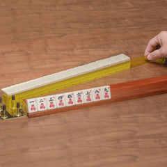 Yellow Mountain Imports American Mahjong tile pushers in use demonstrating smooth wall alignment