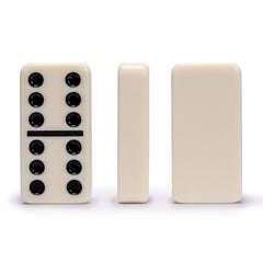 Open dark oak case showing the organized domino set inside