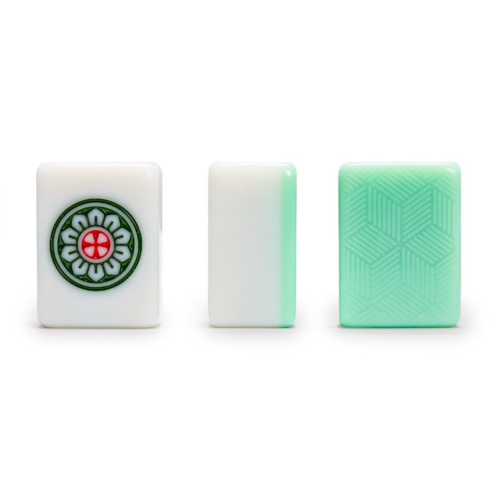 Engraving detail on Emerald Weave Mahjong tiles highlighting symbols