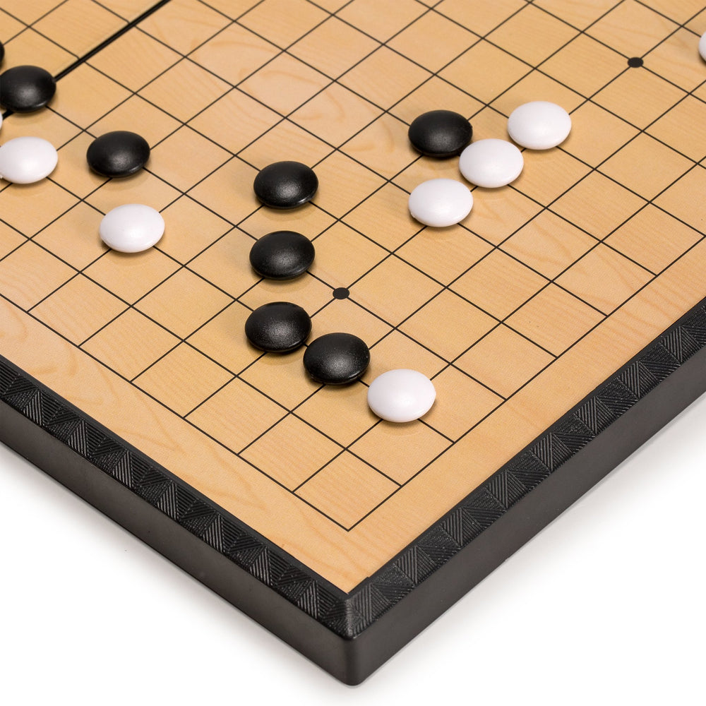 Yellow Mountain Imports white magnetic Go stones stay secure for steady play