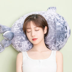 YESGIRL seal plush pillow used as a cuddle companion for adults.