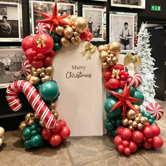 YMSZ Christmas party setup with arch backdrop, perfect for selfies and celebrations.
