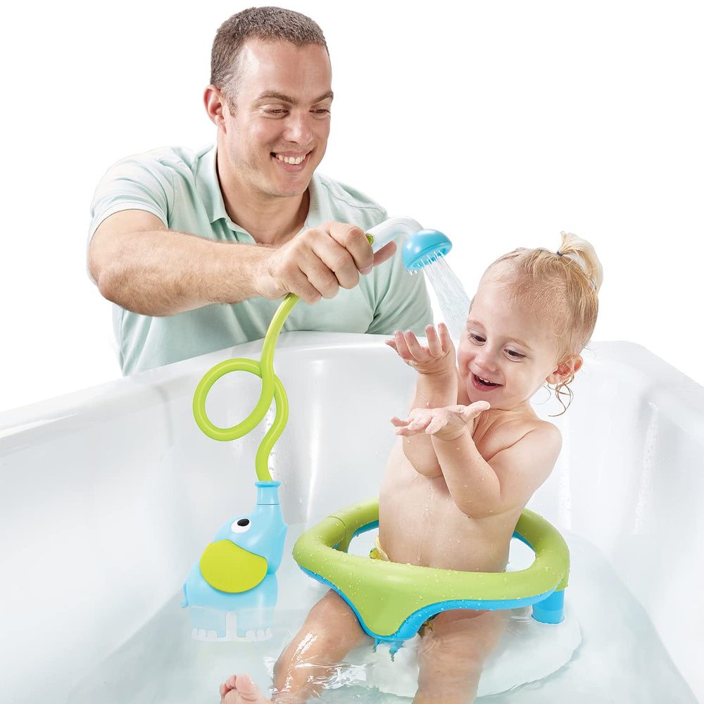 Yookidoo bath time bonding with parent and child during rinsing.