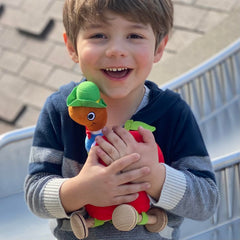 YOTTOY Applecar rolls on wooden wheels for tactile motion play