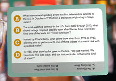 Close-up of You Gotta Know TV cards with vivid artwork.