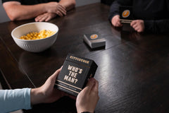 You Gotta Know's Who's the Man? game-night-setup invites groups to reminisce and bond.