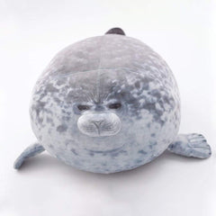 YOZATIA Chubby Blob Seal Pillow used as a comfy nap pillow during breaks