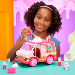 Yummiland dolls seated in the front of the truck for play.