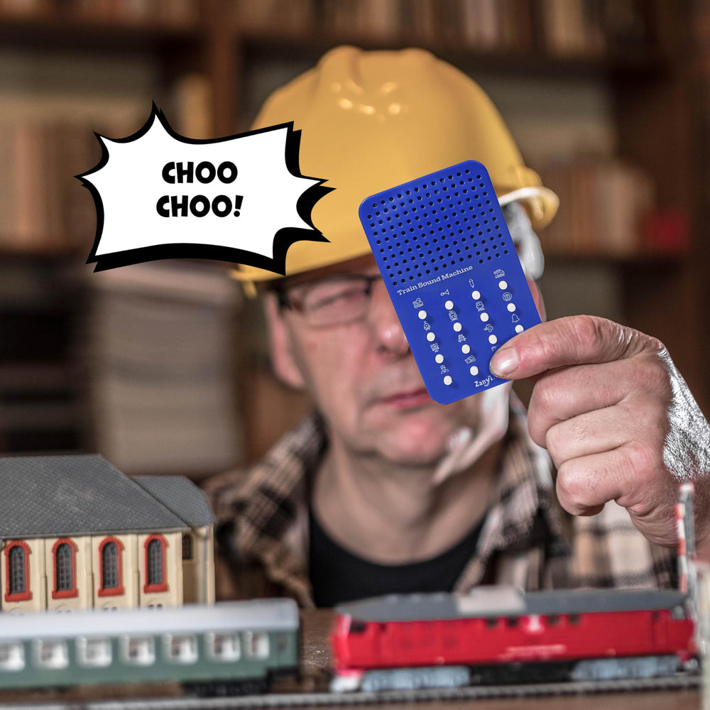 ZANY TRAINS Train Noisemaker in use by a child during pretend train ride.