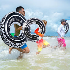 Zaruatu pool party decor tire floats as props.