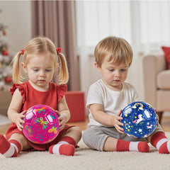 Glitter blue and pink ball catches sunlight for playful outdoor fun