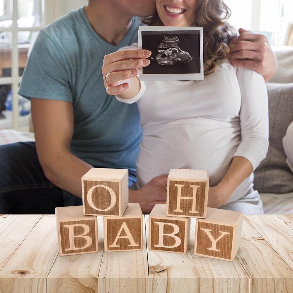 ZouYee Oh Baby wooden blocks arranging O H B A B Y for display.