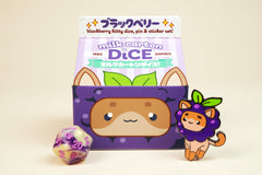 1985 Games dice set inside milk carton highlighted with playful fruit meadow vibes for tabletop play.
