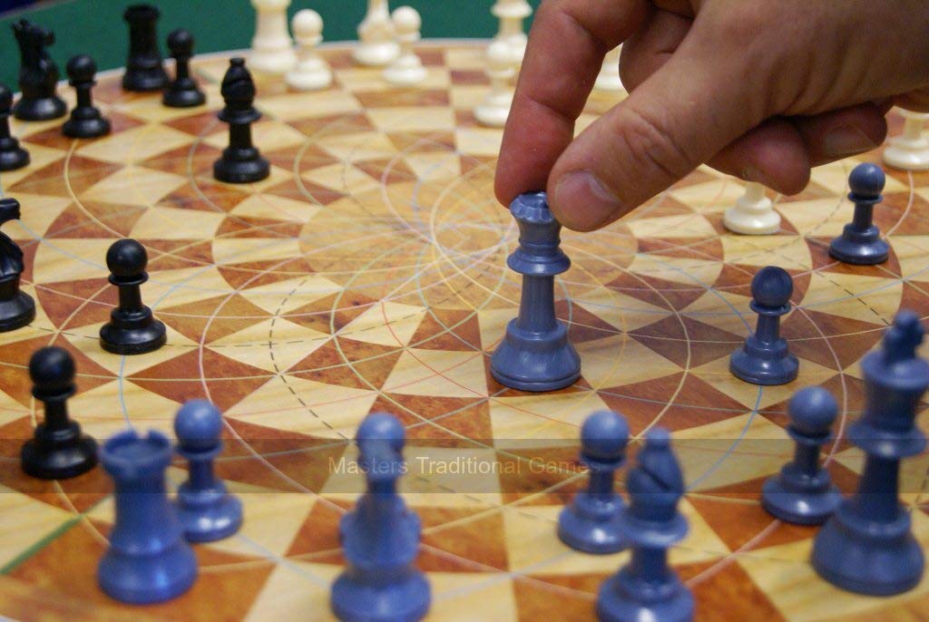 3 Man Chess retail packaging includes board, pieces, and rule sheet.