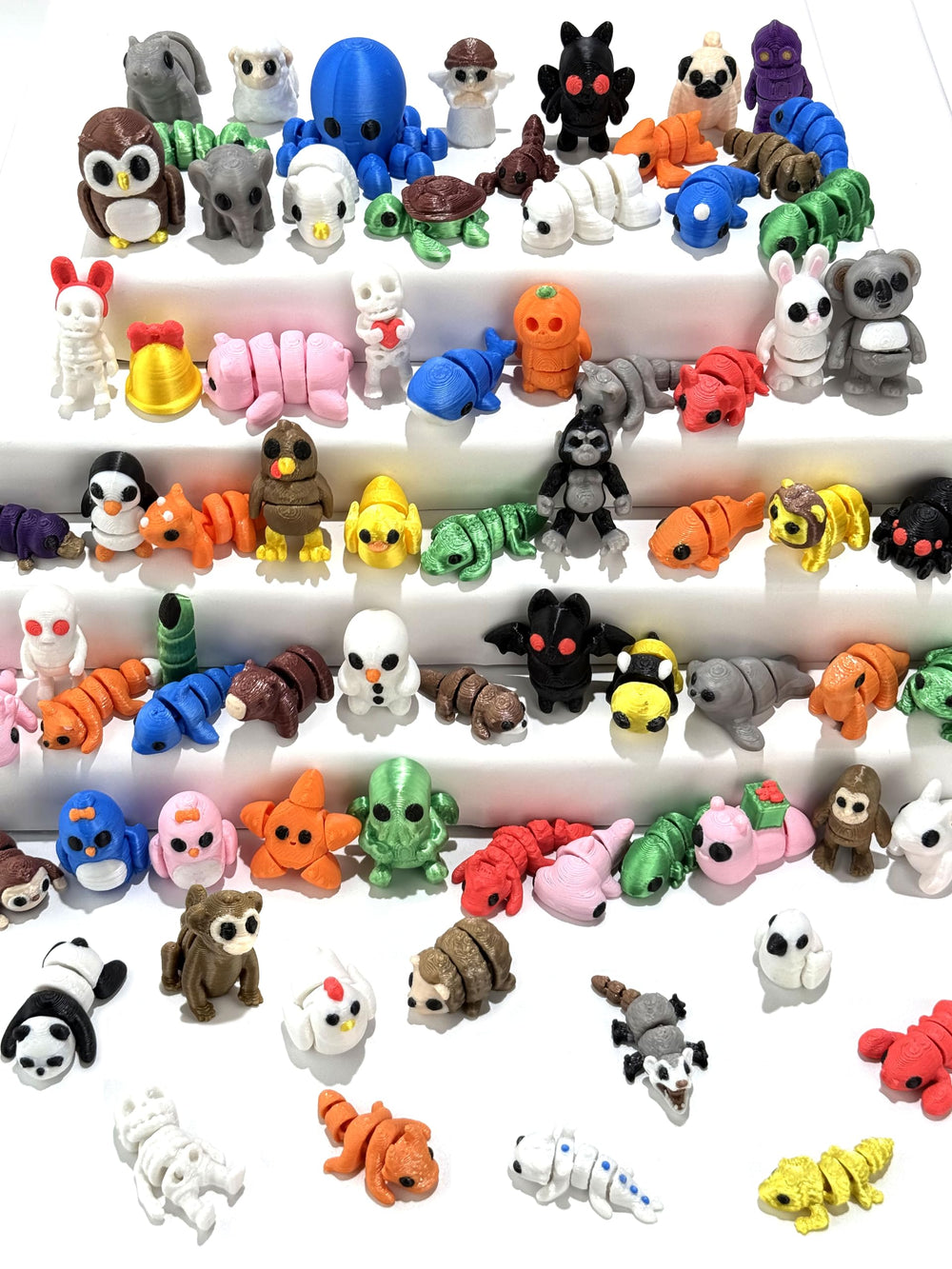 66 Pcs Mini 3D Printed Animal Figurines set with diverse colors for kids' imaginative play