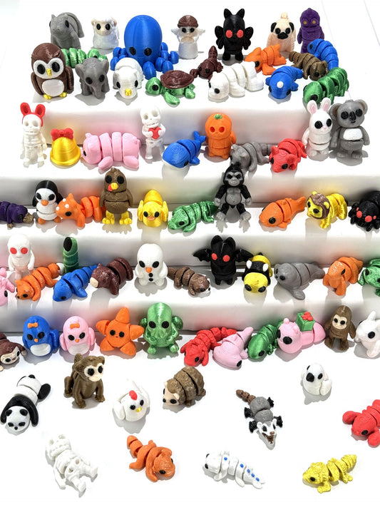 66 Pcs Mini 3D Printed Animal Figurines set with diverse colors for kids' imaginative play