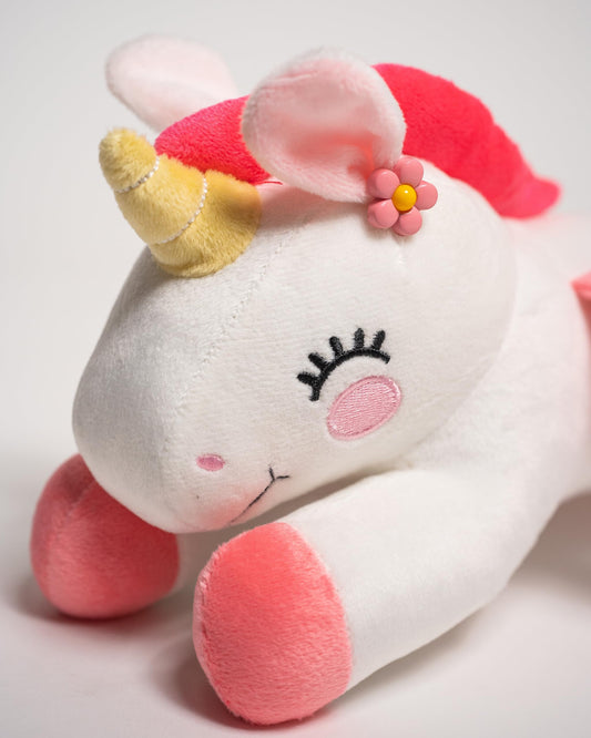 A FOR ADLEY unicorn plushie side with cutie mark, ideal for cozy bedtime stories.