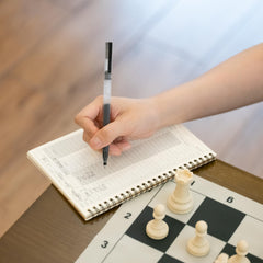 A&A chess scorebook signature area for post-game notes