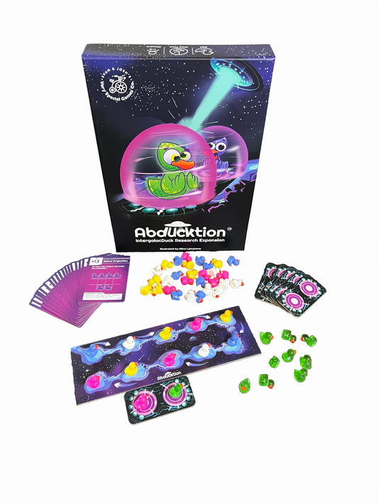 Abducktion IntergalacDuck expansion box with boards and cards for family game night.