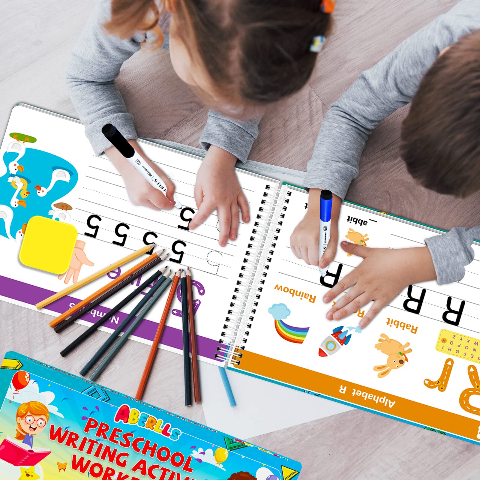 ABERLLS handwriting child writing in workbook boosts fine motor skills