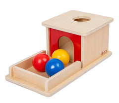 Adena Montessori wooden toy with three balls for early object permanence and visual tracking.