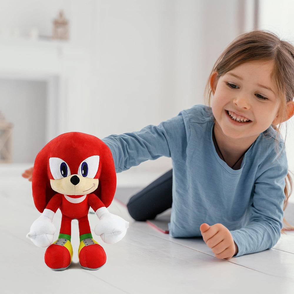 Adenzai red plush toy bed-time companion adds comfort during stories.