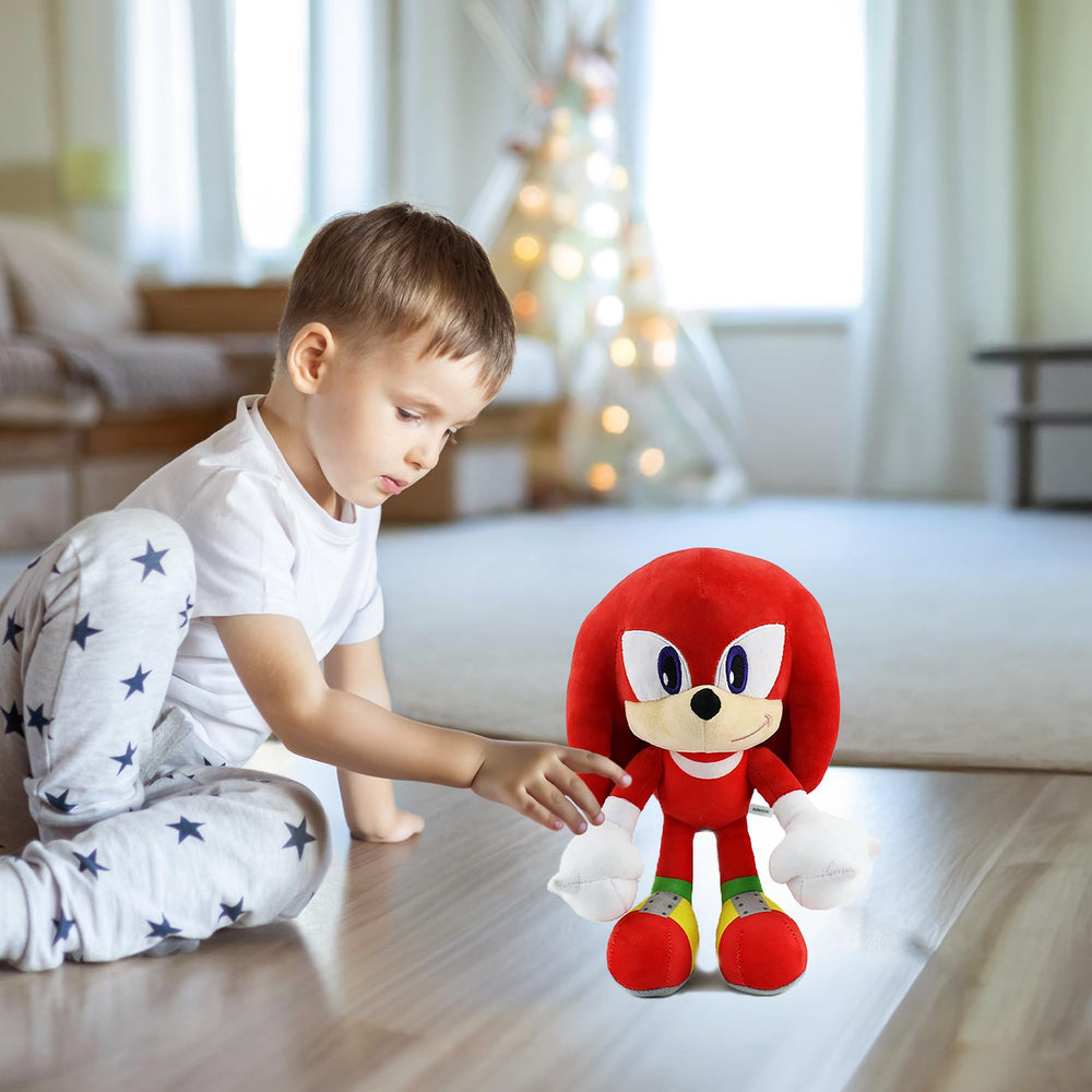 Adenzai red plush toy for playtime and quiet moments of companionship.