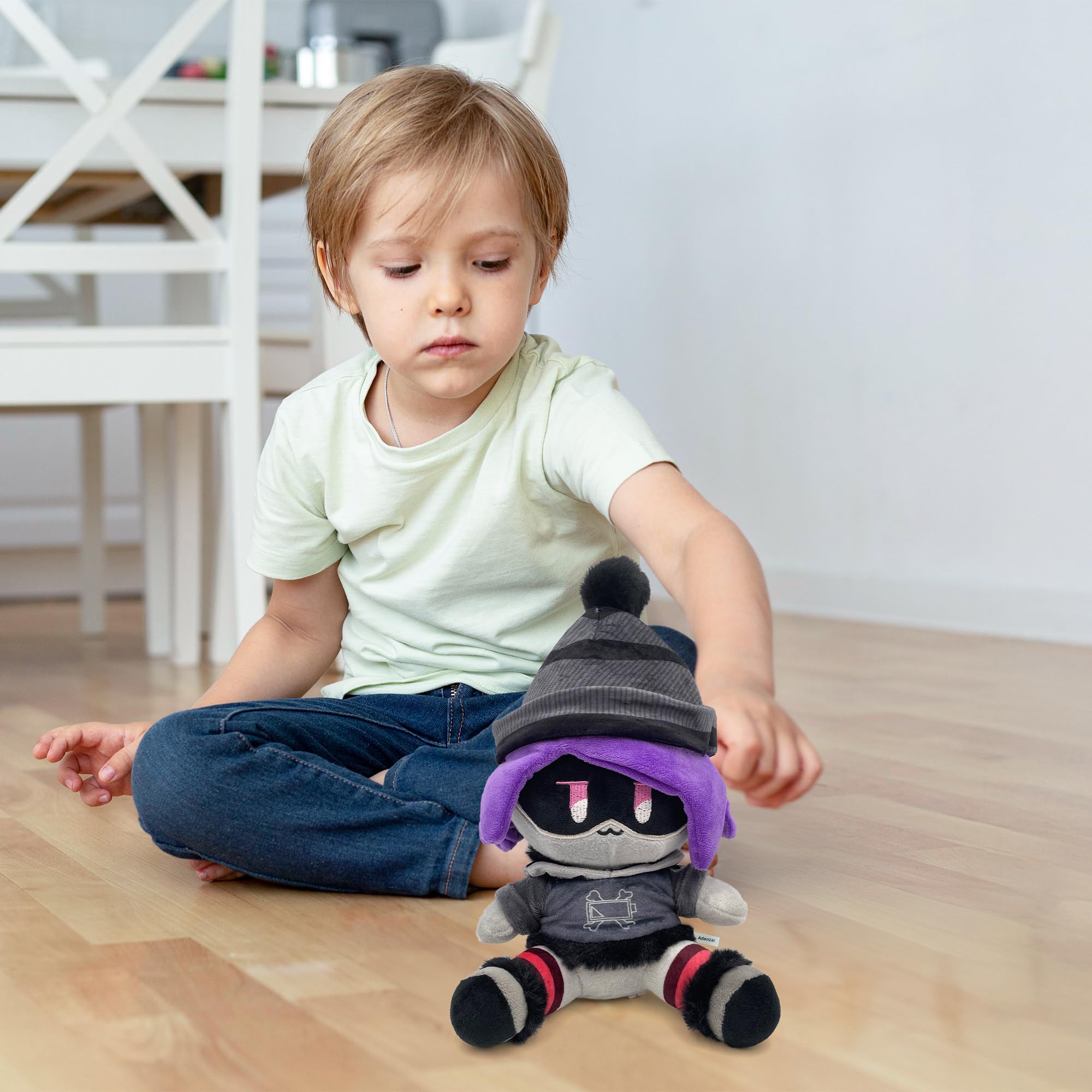 Adenzai Uzi plush fits easily into bags and car rides.