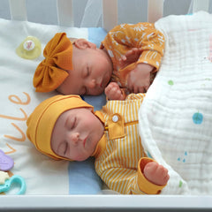 Poseable limbs on ADFO twin dolls for role play and care routines