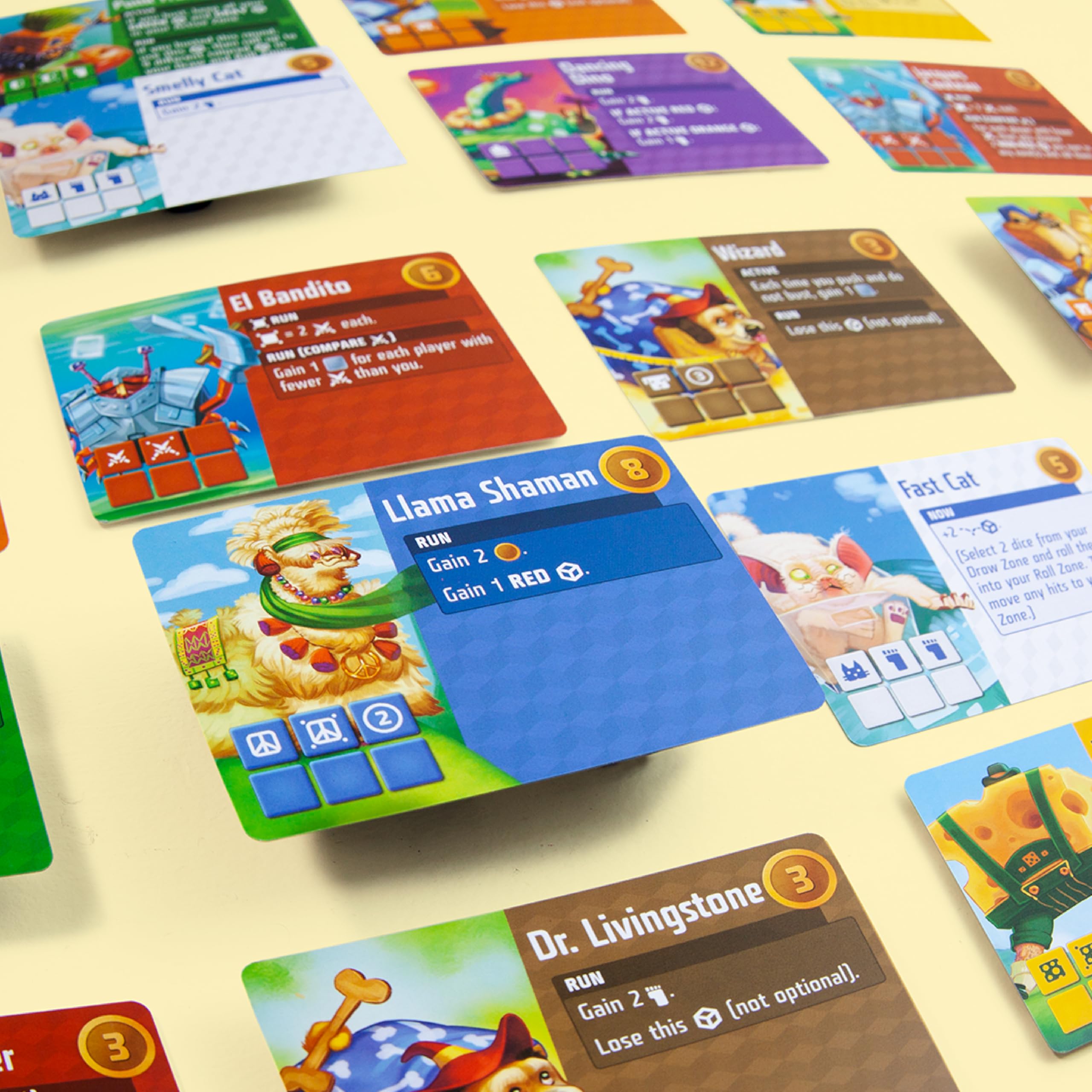 AEG Cubitos game components spread across a table for a cozy night